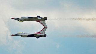 I love it when Thunderbird F-16s fly crazy close to make a mirror image